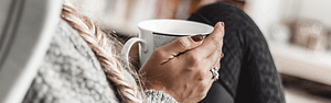 woman with warm cup of tea