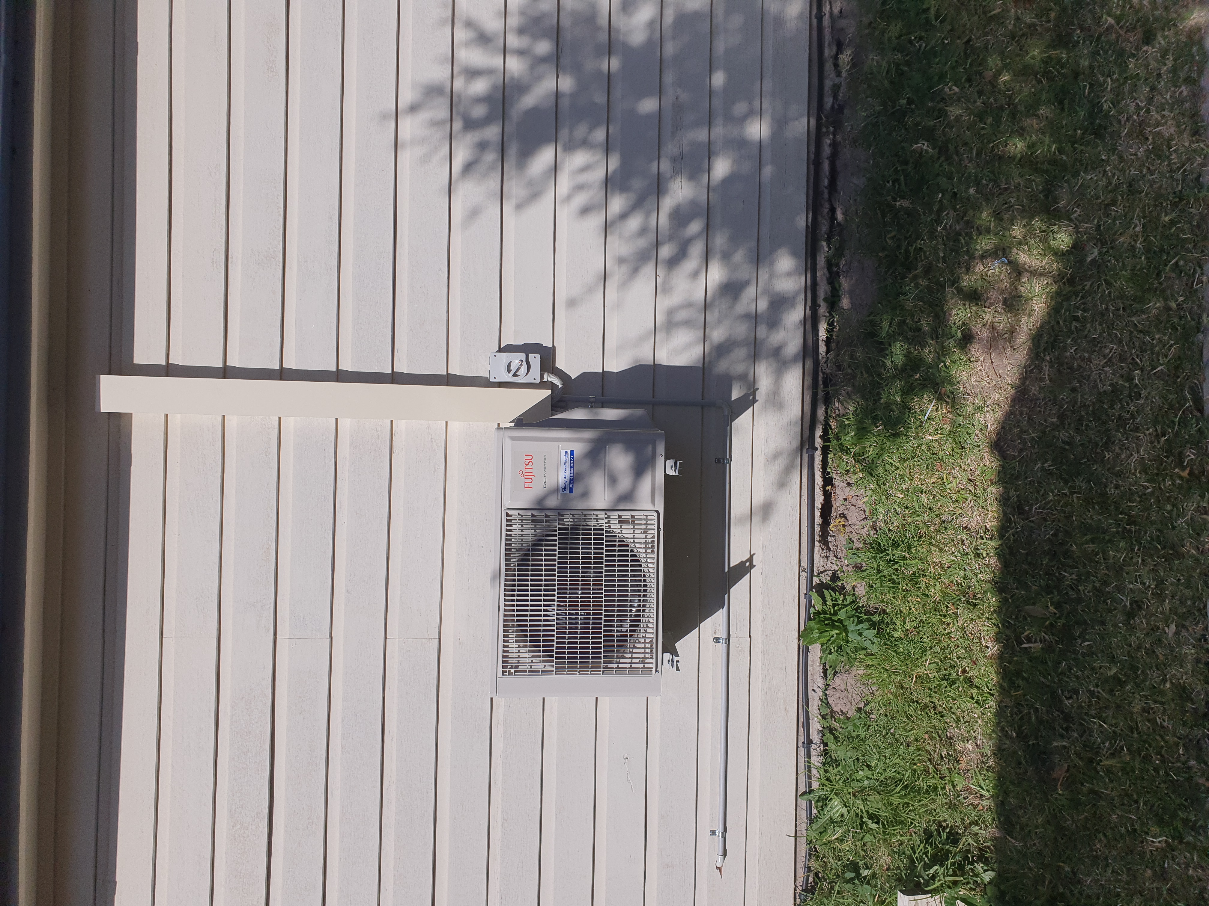 Split system air conditioner outdoor unit installation Adamstown NSW